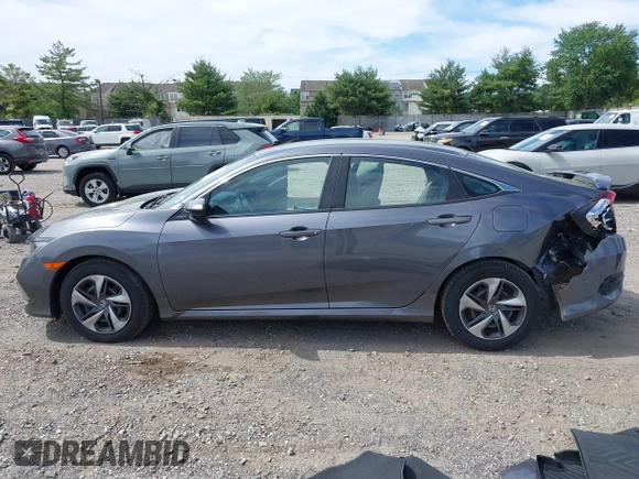 2021 Honda Civic LX with VIN 2HGFC2F65MH525423, listed as a IAAI auction lot 42319862 with 37,248 mi miles and . Bid and sale history available at DreamBid. Image 14.
