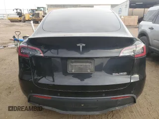 2022 Tesla Model Y Performance with VIN 7SAYGDEF3NF546385, listed as a Copart auction lot 83784984 with 30,769 mi miles and Salvage Title. Bid and sale history available at DreamBid. Image 6.