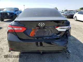 2018 Toyota Camry LE with VIN JTNB11HK9J3055995, listed as a Copart auction lot 54940115 with 110,048 mi miles and Salvage title. Bid and sale history available at DreamBid. Image 6.