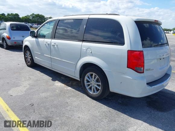 2014 Dodge Grand Caravan SXT with VIN 2C4RDGCGXER322705, listed as a IAAI auction lot 42170301 with 147,070 mi miles and . Bid and sale history available at DreamBid. Image 3.