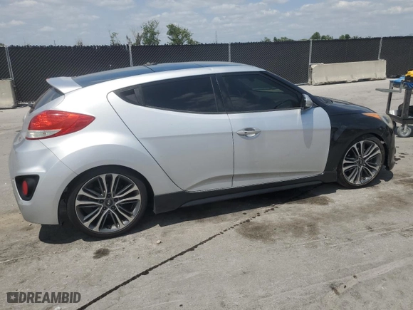 2014 Hyundai Veloster Turbo with VIN KMHTC6AE0EU192680, listed as a Copart auction lot 54486575 with 129,949 mi miles and Clean Title. Bid and sale history available at carsss.com. Image 3.