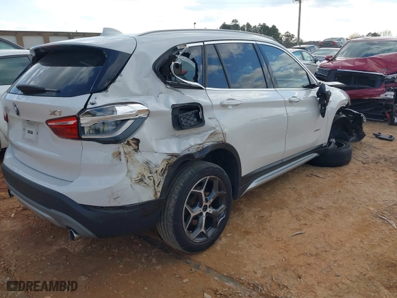 2018 BMW X1 sDrive28i with VIN WBXHU7C37J5H39401, listed as a IAAI auction lot 41421610 with 94,576 mi miles. Bid and sale history available at carsss.com. Image 4.