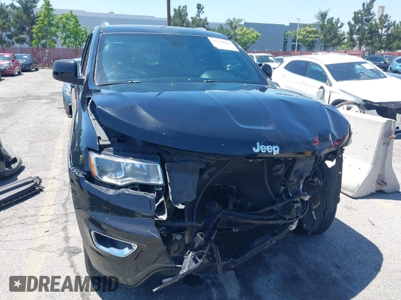 2018 Jeep Grand Cherokee Laredo E z VIN 1C4RJEAG9JC131344, wystawiony jako IAAI lot #42218060 z przebiegiem 126 639 mil mil oraz . Historia ofert i sprzedaży dostępna na DreamBid. Obrazek 13.