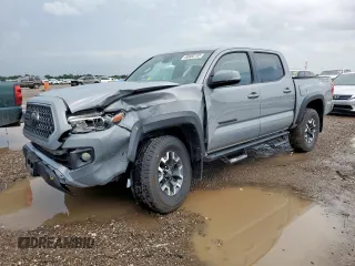 2018 Toyota Tacoma SR5 z VIN 5TFAZ5CN4JX054537, wystawiony jako Copart lot #60800195 z przebiegiem 106 330 mil mil oraz Szkoda całkowita • Salvage title. Historia ofert i sprzedaży dostępna na DreamBid. Obrazek 1.