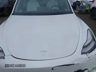 2023 Tesla Model Y Long Range with VIN 7SAYGDEE1PA106057, listed as a IAAI auction lot 41778642 with 1 mi miles. Bid and sale history available at carsss.com. Image 10.
