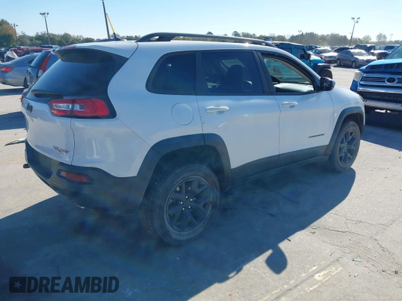 2018 Jeep Cherokee Trailhawk z VIN 1C4PJMBX8JD562994, wystawiony jako IAAI lot #41281555 z przebiegiem 86 702 mil mil oraz . Historia ofert i sprzedaży dostępna na DreamBid. Obrazek 4.
