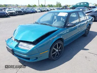1995 Saturn SL with VIN 1G8ZK5277SZ320711, listed as a IAAI auction lot 42115543 with 77,558 mi miles and . Bid and sale history available at DreamBid. Image 17.