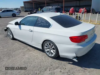 2011 BMW 3 Series 328i with VIN WBAKE3C58BE557891, listed as a IAAI auction lot 41717023 with 99,053 mi miles and . Bid and sale history available at carsss.com. Image 3.