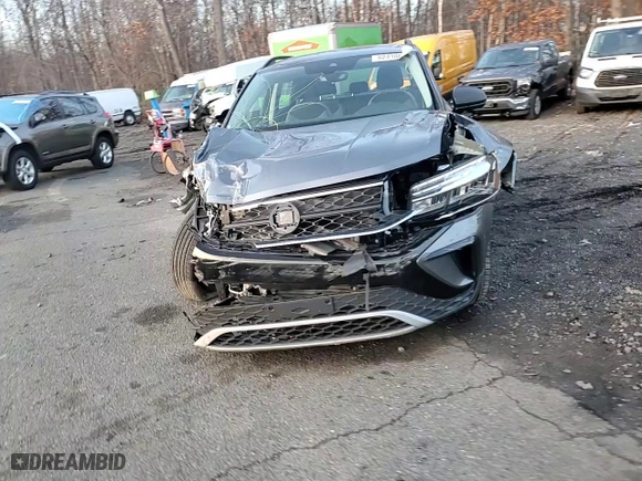 2024 Volkswagen Taos S with VIN 3VV8X7B2XRM080392, listed as a Copart auction lot 82410604 with 6,966 mi miles and Salvage Title. Bid and sale history available at carsss.com. Image 12.