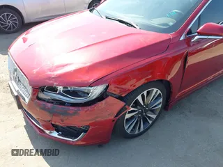 2019 Lincoln MKZ Hybrid Reserve II with VIN 3LN6L5MU7KR617325, listed as a IAAI auction lot 42584481 with 76,118 mi miles and . Bid and sale history available at DreamBid. Image 6.