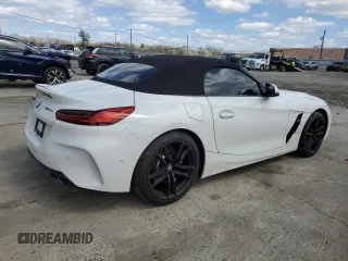 2021 BMW Z4 sDrive30i with VIN WBAHF3C09MWX24087, listed as a Copart auction lot 52036575 with 0 mi miles and Salvage Title. Bid and sale history available at carsss.com. Image 3.