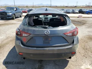 2016 Mazda 3 S Touring with VIN JM1BM1M3XG1342809, listed as a Copart auction lot 61915845 with 141,227 mi miles and Salvage title. Bid and sale history available at DreamBid. Image 6.