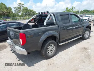2014 Nissan Frontier SV z VIN 1N6AD0ER9EN751010, wystawiony jako IAAI lot #42326309 z przebiegiem 199 871 mil mil oraz . Historia ofert i sprzedaży dostępna na DreamBid. Obrazek 4.