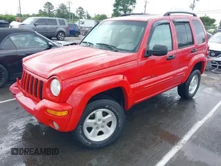 2002 Jeep Liberty Limited z VIN 1J8GL58K42W262492, wystawiony jako IAAI lot #42121270 z przebiegiem 167 662 mil mil oraz . Historia ofert i sprzedaży dostępna na DreamBid. Obrazek 2.