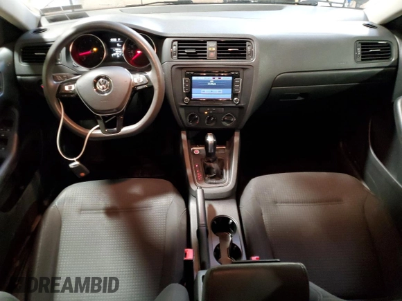 2015 Volkswagen Jetta S with VIN 3VW2K7AJ3FM413861, listed as a Copart auction lot 61868405 with 84,000 mi miles and Salvage title. Bid and sale history available at DreamBid. Image 8.