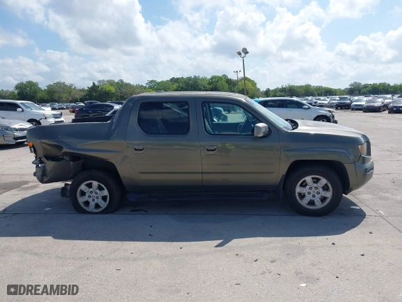 2007 Honda Ridgeline RTL w/Leather with VIN 2HJYK16527H547522, listed as a IAAI auction lot 41939603 with 127,899 mi miles. Bid and sale history available at carsss.com. Image 13.