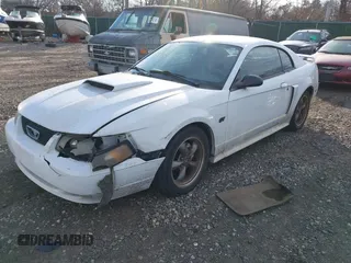2003 Ford Mustang GT Deluxe with VIN 1FAFP42X03F309689, listed as a IAAI auction lot 41360816 with 999,999 mi miles. Bid and sale history available at carsss.com. Image 2.