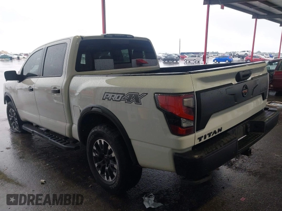 2021 Nissan Titan Pro-4X z VIN 1N6AA1ED7MN511004, wystawiony jako IAAI lot #42184599 z przebiegiem 36 086 mil mil oraz . Historia ofert i sprzedaży dostępna na DreamBid. Obrazek 3.