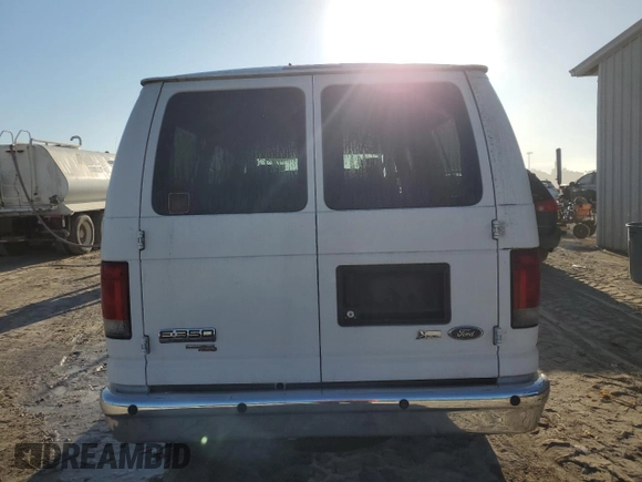 2011 Ford Econoline Passenger XL with VIN 1FBNE3BLXBDA42711, listed as a Copart auction lot 44326425 with 476,137 mi miles and Salvage Title. Bid and sale history available at carsss.com. Image 6.
