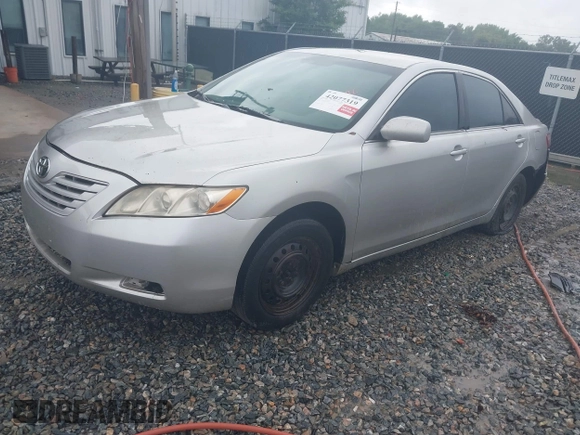 2009 Toyota Camry with VIN 4T1BE46K19U291796, listed as a IAAI auction lot 42077319 with 237,423 mi miles. Bid and sale history available at carsss.com. Image 2.