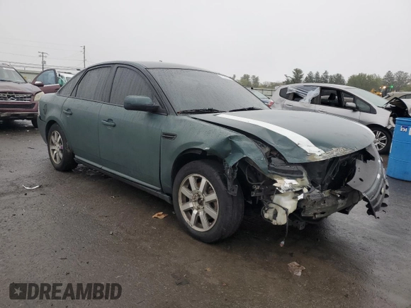 2008 Ford Taurus SEL with VIN 1FAHP24W38G170693, listed as a Copart auction lot 73331994 with 185,112 mi miles and Salvage Title. Bid and sale history available at carsss.com. Image 4.