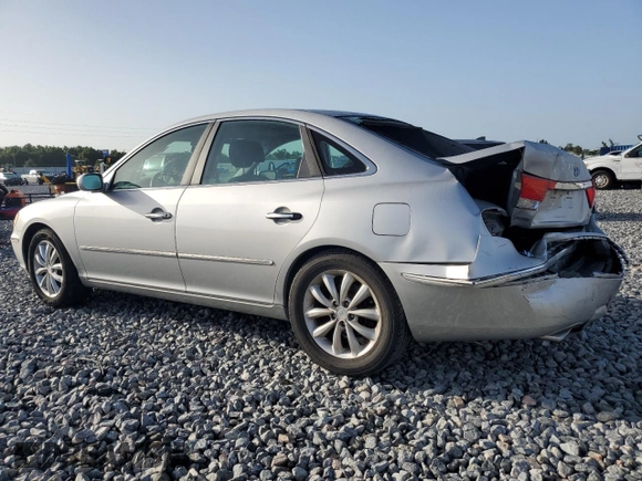 2006 Hyundai Azera SE with VIN KMHFC46F96A037972, listed as a Copart auction lot 61035765 with 140,857 mi miles and Salvage title. Bid and sale history available at DreamBid. Image 2.