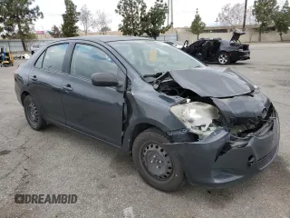 2009 Toyota Yaris with VIN JTDBT903291324461, listed as a Copart auction lot 54769875 with 141,777 mi miles and Salvage Title. Bid and sale history available at DreamBid. Image 4.