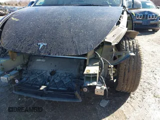 2022 Tesla Model Y Performance with VIN 7SAYGDEFXNF313636, listed as a IAAI auction lot 41660019 with 30,258 mi miles and . Bid and sale history available at DreamBid. Image 6.