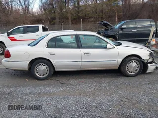 1998 Lincoln Continental with VIN 1LNFM97VXWY619313, listed as a IAAI auction lot 41477852 with 158,973 mi miles. Bid and sale history available at carsss.com. Image 14.