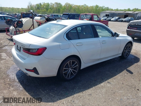 2019 BMW 3 Series 330i xDrive with VIN WBA5R7C54KAJ79214, listed as a IAAI auction lot 42001361 with 103,265 mi miles. Bid and sale history available at carsss.com. Image 4.