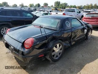 2002 Ford Thunderbird Hardtop Premium z VIN 1FAHP60A22Y107619, wystawiony jako Copart lot #55755765 z przebiegiem 32 306 mil mil oraz Nie do naprawy • Non repairable. Historia ofert i sprzedaży dostępna na DreamBid. Obrazek 3.