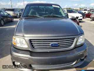 2003 Ford F-150 Lightning with VIN 2FTRF07303CA45572, listed as a Copart auction lot 74384694 with 0 mi miles and Salvage Title. Bid and sale history available at carsss.com. Image 5.