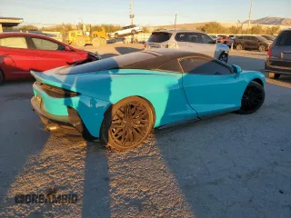 2023 McLaren GT z VIN SBM22GCA0PW002765, wystawiony jako Copart lot #78866364 z przebiegiem Nie podano mil oraz Szkody całkowita. Historia ofert i sprzedaży dostępna na DreamBid. Obrazek 3.