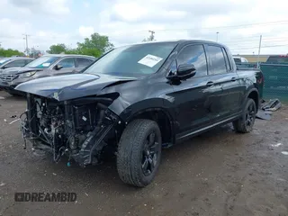 2024 Honda Ridgeline Black Edition with VIN 5FPYK3F86RB030458, listed as a IAAI auction lot 42180255 with 10,513 mi miles and . Bid and sale history available at DreamBid. Image 2.