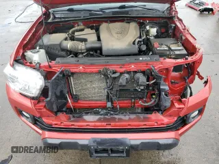 2019 Toyota Tacoma SR z VIN 3TMCZ5AN9KM215368, wystawiony jako Copart lot #66554414 z przebiegiem 84 380 mil mil oraz Szkoda całkowita • Salvage title. Historia ofert i sprzedaży dostępna na DreamBid. Obrazek 11.