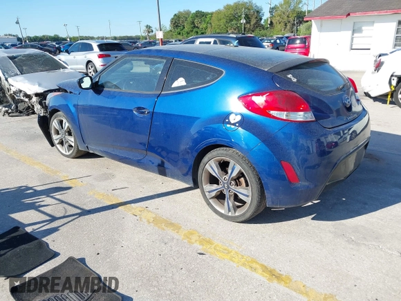 2016 Hyundai Veloster with VIN KMHTC6AD8GU302014, listed as a IAAI auction lot 41764406 with 102,893 mi miles. Bid and sale history available at carsss.com. Image 3.