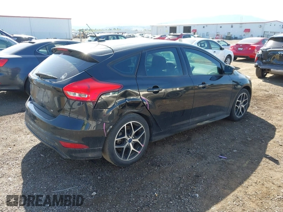 2015 Ford Focus SE with VIN 1FADP3K26FL320689, listed as a IAAI auction lot 42160904 with 95,136 mi miles and . Bid and sale history available at DreamBid. Image 4.