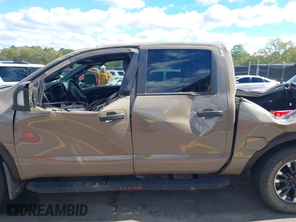 2021 Nissan Titan Pro-4X with VIN 1N6AA1ED4MN531369, listed as a IAAI auction lot 40597122 with 32,161 mi miles and . Bid and sale history available at DreamBid. Image 14.