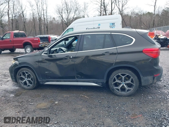 2018 BMW X1 xDrive28i with VIN WBXHT3C34J5K31430, listed as a IAAI auction lot 41954792 with 125,447 mi miles. Bid and sale history available at carsss.com. Image 14.