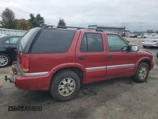1999 GMC Jimmy SLE with VIN 1GKDT13W3X2546163, listed as a Copart auction lot 79842734 with 144,800 mi miles and Salvage Title. Bid and sale history available at carsss.com. Image 3.