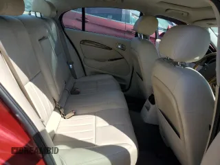 2003 Jaguar S-Type z VIN SAJEA01U13HM90556, wystawiony jako Copart lot #59578535 z przebiegiem 50 723 mil mil oraz Czysty tytuł • Clean title. Historia ofert i sprzedaży dostępna na DreamBid. Obrazek 10.