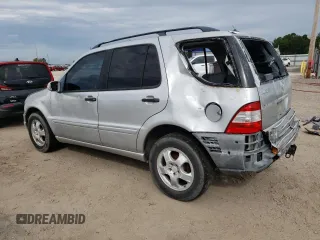 2002 Mercedes-Benz M-Class with VIN 4JGAB54E52A360097, listed as a Copart auction lot 72983104 with 199,445 mi miles and Salvage Title. Bid and sale history available at carsss.com. Image 2.