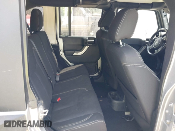 2016 Jeep Wrangler Unlimited Rubicon Hard Rock with VIN 1C4BJWFG6GL265320, listed as a IAAI auction lot 42260151 with Not provided miles and . Bid and sale history available at DreamBid. Image 8.