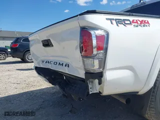 2023 Toyota Tacoma 4WD SR with VIN 3TMCZ5AN8PM647523, listed as a IAAI auction lot 41887896 with 17,864 mi miles. Bid and sale history available at carsss.com. Image 20.