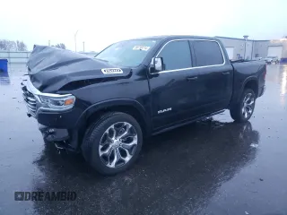 2023 Ram 1500 Longhorn with VIN 1C6SRFKT0PN581982, listed as a Copart auction lot 80799214 with 33,244 mi miles and Salvage title. Bid and sale history available at DreamBid. Image 1.