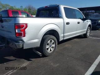 2019 Ford F-150 XL with VIN 1FTEW1C54KKC55212, listed as a IAAI auction lot 42025872 with 143,485 mi miles and . Bid and sale history available at DreamBid. Image 4.