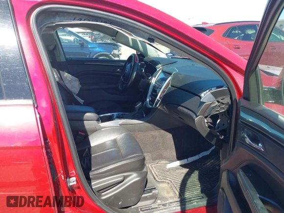 2014 Cadillac SRX with VIN 3GYFNAE36ES597007, listed as a IAAI auction lot 41675527 with 105,613 mi miles and . Bid and sale history available at DreamBid. Image 5.