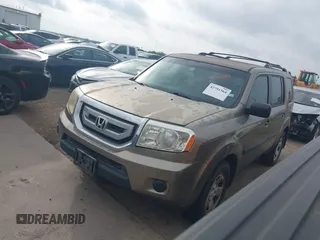 2011 Honda Pilot LX with VIN 5FNYF3H2XBB045721, listed as a IAAI auction lot 42791364 with 149,258 mi miles and . Bid and sale history available at DreamBid. Image 2.