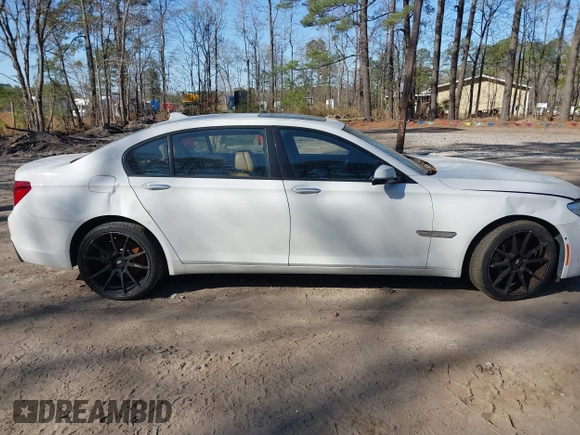 2014 BMW 7 Series 740Li with VIN WBAYE4C59ED138409, listed as a IAAI auction lot 41785423 with 121,687 mi miles. Bid and sale history available at carsss.com. Image 13.