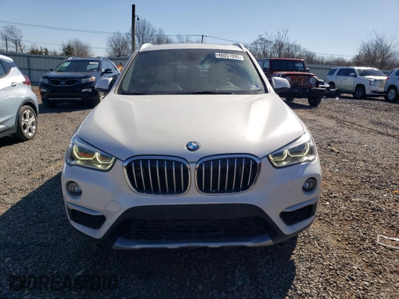 2017 BMW X1 xDrive28i with VIN WBXHT3C31H5F82700, listed as a Copart auction lot 48051095 with 76,861 mi miles and Salvage Title. Bid and sale history available at carsss.com. Image 5.